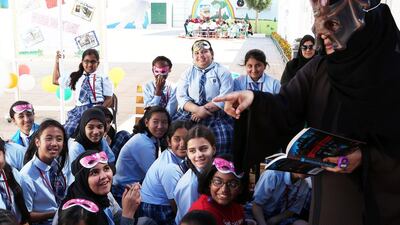 Raseena Parveen, HR group officer, reads a story from ‘Scream Street‘ for Grade 6 students on World Book Day.