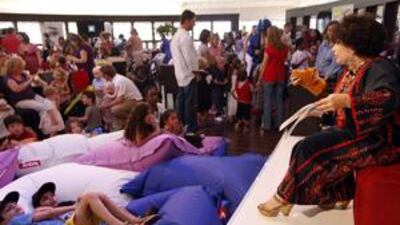 The author Fay Gabriel entertains children at a MEIFF workshop on Saturday.