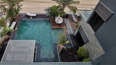 The custom design of this villa also extends to the exterior where a stunning private wooden pool deck has been constructed with a Balinese style pool with surrounding trees that make it extremely private and give it a zen-like atmosphere. Luxhabitat