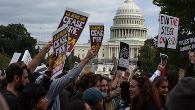 Protesters march past the Capitol building in Washington as part of a demonstration calling for a ceasefire in Gaza. Reuters