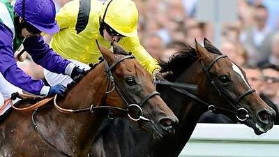 Ryan Moore, in yellow, rides Soraaya to victory in the Princess Margaret Abu Dhabi Stakes at Ascot yesterday.