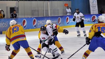 Superb play from Mubarak Al Mazrequei, centre, helped UAE take the lead on Saturday night. Charles Crowell for The National