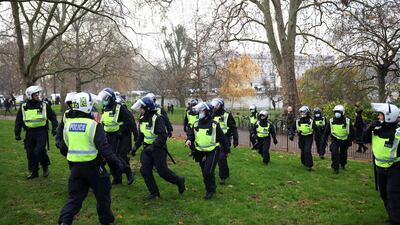 Police officers take position during an anti-lockdown demonstration amid the coronavirus disease (COVID-19) outbreak in London. Reuters