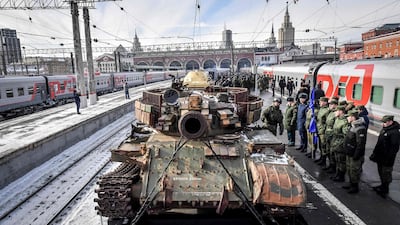 Russian soldiers stand next to the train with "Syrian Breakthrough" exhibition items organised by Russian Defence Ministry on an open carriage at Kazansky railway station in Moscow. AFP