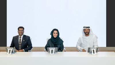 From right, Abdulla bin Touq, UAE Minister of Economy and chairman of the General Civil Aviation Authority; Maryam Al Hammadi, Minister of State and Secretary General of the UAE Cabinet; and Bala Subramanian, UPS chief digital and technology officer, at the unveiling of the UAE Regulations Lab licence for electric cargo aircraft. Photo: Government Media Office