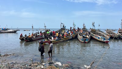 Fishing boats set off at first light and return hours later, their crews untangling and repairing the nets ready for the following morning. Nick Webster / The National