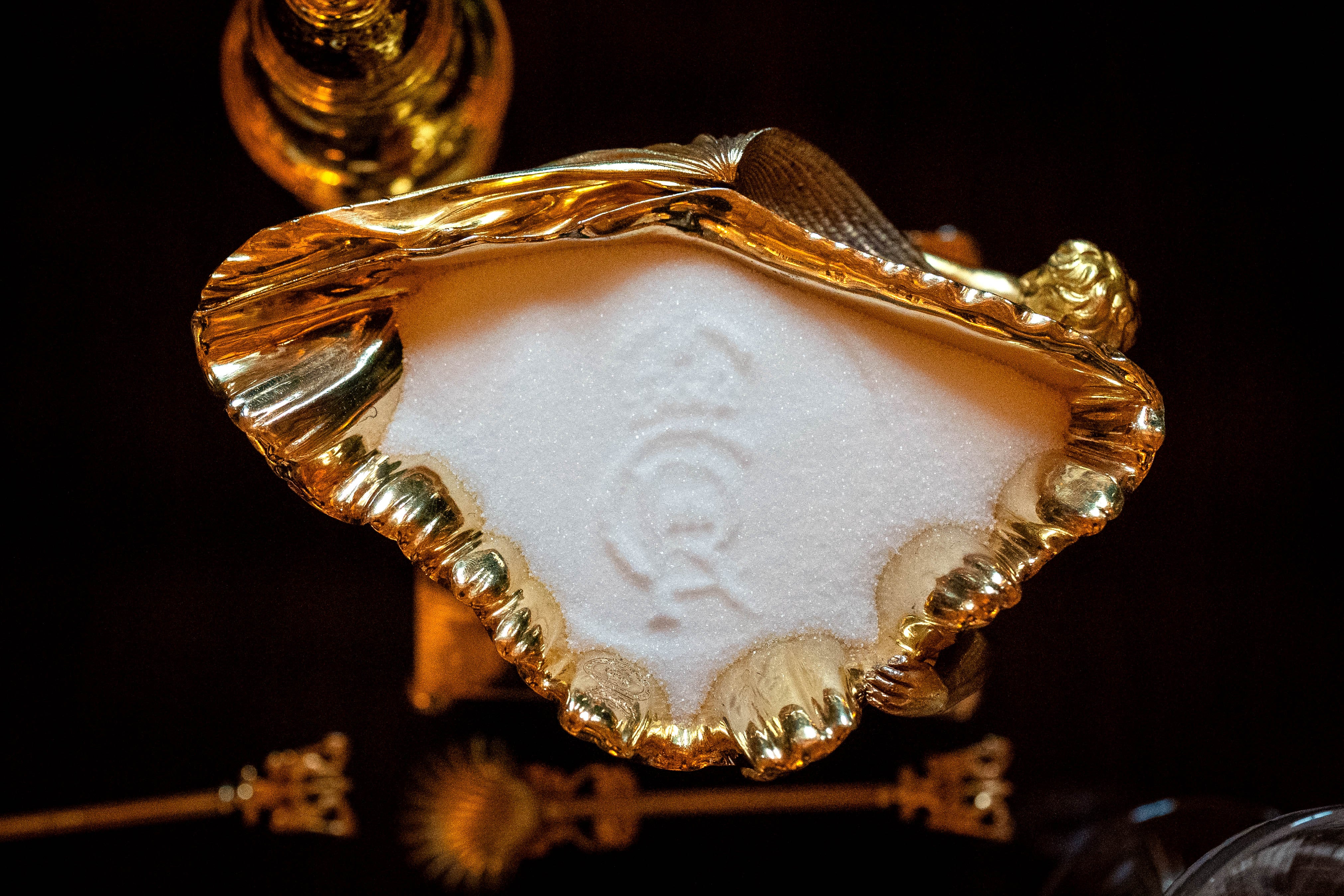 The King Charles III cypher imprinted into salt on the banquet table. Getty Images