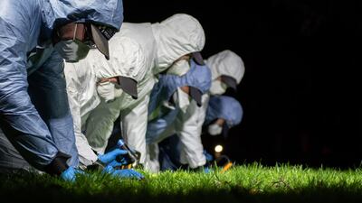 Police officers conduct a search of Poynders Road, London, as they continue the search for Sarah Everard. Sarah, 33, from Brixton, London, has been missing since leaving a friend's home in Clapham on Wednesday, March 3. She was last seen at approximately 21.30 GMT, wearing a green rain jacket, navy blue trousers with a white diamond pattern, turquoise and orange trainers, a white beanie hat, and, possibly, green earphones. Getty Images