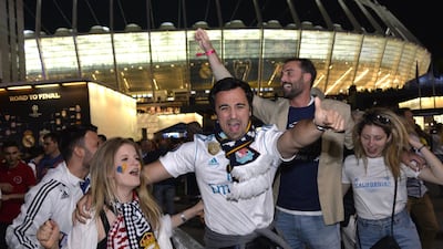 Real Madrid fans celebrate at the stadium in central Kiev. Sergei Chuzavkov / AFP