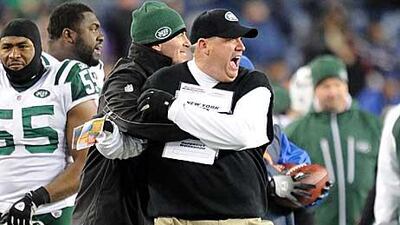 Rex Ryan, the New York Jets head coach, celebrates his side's victory over New England.