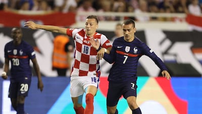 Croatia's Mislav Orsic in action with France's Antoine Griezmann. Reuters