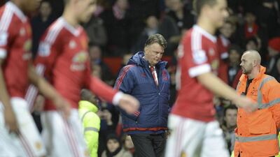 Manchester United’s Dutch manager Louis van Gaal (C) leaves the pitch at full-time during the English Premier League football match between Manchester United and Southampton at Old Trafford in Manchester, north west England, on January 23, 2016. AFP PHOTO / OLI SCARFF