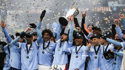 New York City players celebrate their penalty kick shootout win over the Portland Timbers. AP