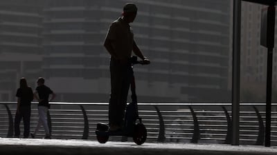 An e-scooter rider in Dubai. The National