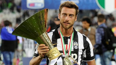 Marchisio with the Serie A trophy in May 2015. Reuters