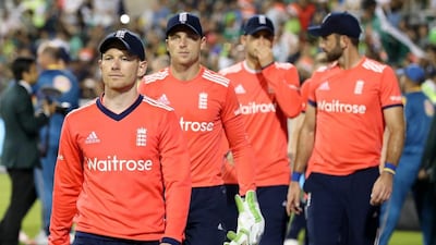 Eoin Morgan, left, has opted out of the tour of Bangladesh, meaning Jos Buttler, second left, will lead the ODI side. Martin Rickett / PA