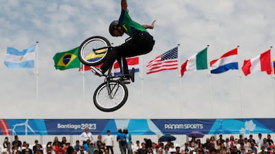 High-flying action from the men's BMX freestyle at the Pan American Games in Santiago, Chile. EPA
