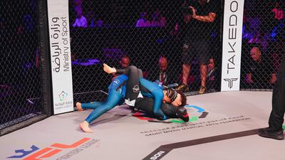 Hattan Al Saif, in black, is mounted by Nada Faheem.