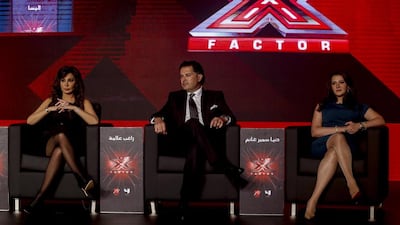 From left, judges Elissa, Ragheb Alama and Donia Ghanem at The X Factor launch in Dubai on March 11. The first episode airs on MBC4 and MBC Masr on March 14. Antonie Robertson / The National