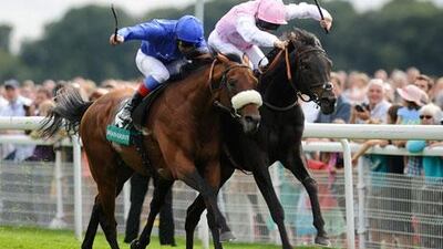 Frankie Dettori and Opinion Poll, left, bumped their way to a victory past Duncan and rider Eddie Ahern in the Group 2 Lonsdale Cup.