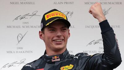 Max Verstappen of Red Bull celebrates his second place finish on the podium in Sunday's Japanese Grand Prix. Yuya Shino / AFP / October 9, 2016