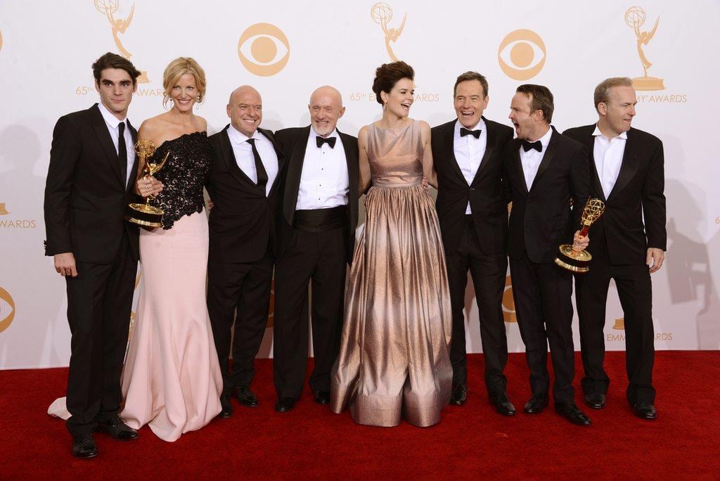 The Breaking Bad cast, from left, RJ Mitte, Anna Gunn, Dean Norris, Jonathan Banks, Betsy Brandt, Bryan Cranston, Aaron Paul and Bob Odenkirk, with the best drama series award. AP