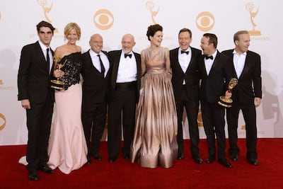The Breaking Bad cast, from left, RJ Mitte, Anna Gunn, Dean Norris, Jonathan Banks, Betsy Brandt, Bryan Cranston, Aaron Paul and Bob Odenkirk, with the best drama series award. AP