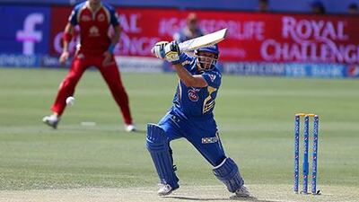 Mike Hussey, the man of the match, put on an 87-run partnership with Lendl Simmons as Mumbai beat Delhi. Pawan Singh / The National