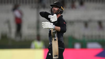 New Zealand batsman Devon Conway leaves the field after being dismissed by England's Liam Livingstone during the T20 World Cup semi-final in Abu Dhabi. AP Photo