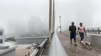 Fog along the Marina Promenade. Antonie Robertson / The National.