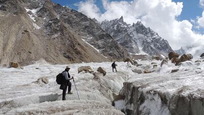 Graduate student Bisma Qazi, left, treks along a crevasse while climbing the Chhota Shigri glacier in Himachal Pradesh on Octpber 4, 2014. Courtesy JNU/IHCAP