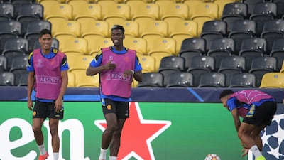 Left to right: Raphael Varane, Paul Pogba and Jesse Lingard. AFP