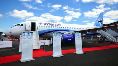 A Sukhoi Superjet 100 on static display. Britain has delivered a calculated diplomatic snub to Russia by failing to invite any of its government officials to the airshow in protest over Moscow's actions in Ukraine. Carl Court / AFP