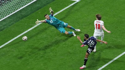 Anthony Gordon scores the opening goal for England against Argentina. EPA