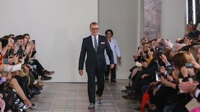 Designer Georges Chakra greets the audience after his show. Courtesy Georges Chakra