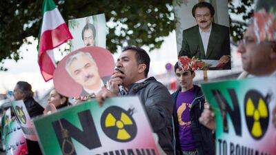 Iranian exiles demonstrate in Hamburg, under the slogan "No to Rouhani - an end to the religious dictatorship in Iran", during a panel discussion with the former Iranian nuclear negotiator Hussein Mussawian, in Germany. Maja Hitij / EPA