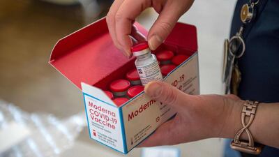 A refrigerated box of Moderna’s Covid-19 vaccine is opened in Boston, US. AFP
