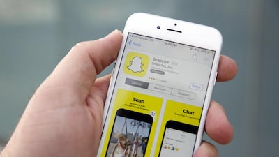 The Snapchat app has fallen foul of telecoms regulations in the UAE but it has many fans. Patrick T Fallon / Bloomberg