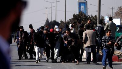 People escape during an attack on the Intercontinental Hotel in Kabul, Afghanistan January 21, 2018. Mohammad Ismail / Reuters