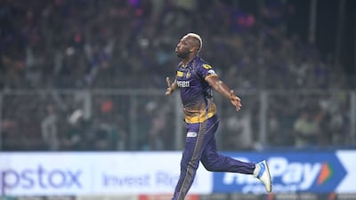 Kolkata Knight Riders' Andre Russell celebrates after taking the wicket of Sunrisers Hyderabad's Rahul Tripathi. AFP