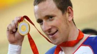 Bradley Wiggins displays his gold medal from the Individual Pursuit at the Beijing 2008 Olympics.