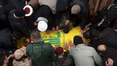Mourners attend the funeral in Jibshit, Lebanon, of Ali Ahmed Sabra, a member of Hizbollah who was killed alongside Syrian government forces in Aleppo, on February 6. Mahmoud Zayyat / AFP