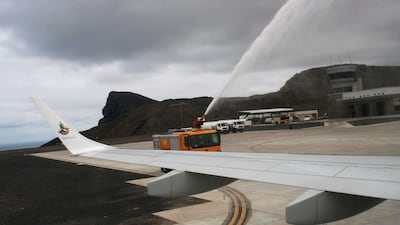 A fire truck sprays water over the first ever commercial flight to land at St Helena airport near Jamestown, October 14, 2017. Ed Cropley / Reuters