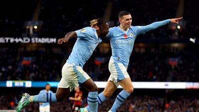 City's Phil Foden celebrates with Jeremy Doku of Manchester City after scoring. Getty Images