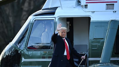 Outgoing US President Donald Trump waves as he boards Marine One at the White House in Washington. AFP