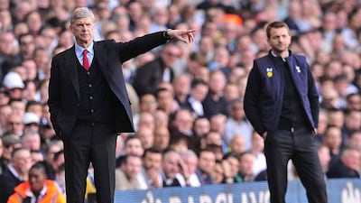 Arsenal and Arsene Wenger trail Chelsea by four points in the Premier League title race after their win on Sunday. Carl Court / AFP / March 16, 2014