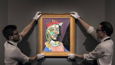 Pablo Picasso's 'Femme au beret et a la robe quadrillee'. Getty Images