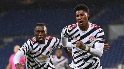 Marcus Rashford celebrates his late goal. AFP