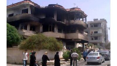 A burnt-out building in the southern city of Daraa, Syria, where the army last week shelled residential areas and unleashed security forces in an intensified push to crush the uprising against President Bashar al Assad, killing an 8-year-old boy and at least 17 others, a human rights group said.