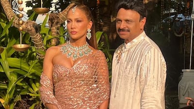 Jennifer Lopez with Rama Raju Mantena, the father of the bride, at the wedding. Wizcraft Weddings / Instagram
